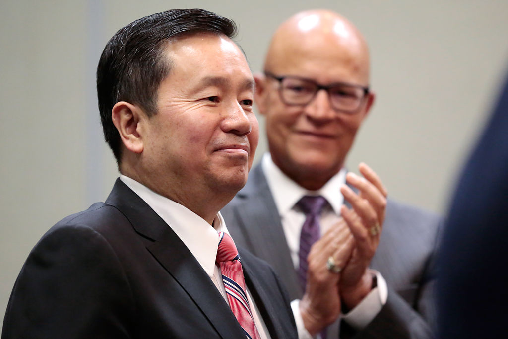 Mike Middleton congratulates Dr. Mun Choi